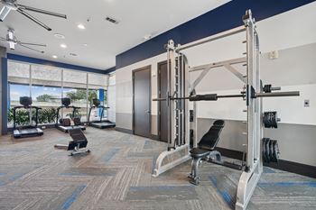 24-Hr fitness club with cardio equipment & free weights